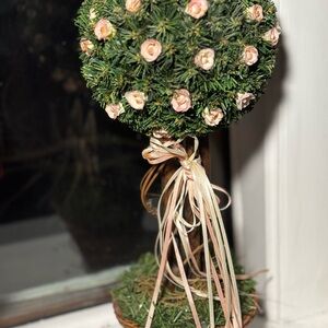 Elegant Floral Topiary with Pink Accents and European Garden Designs